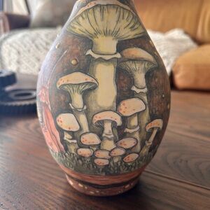 NEVER USED CJ NIEHAUS VASE with moonlight snail and mushroom artwork.